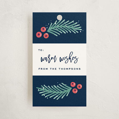 This is a navy gift tags by Hooray Creative called festive foliage printing on signature in tag
