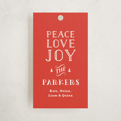 This is a holly gift tags by Carolyn MacLaren called vintage type printing on signature in tag
