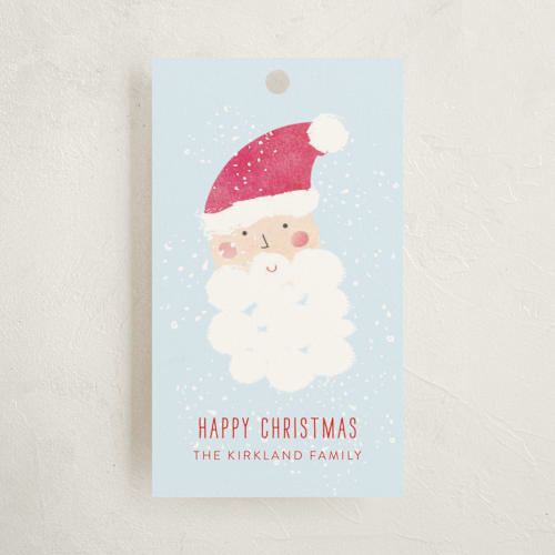 This is a powder blue gift tags with standard by Erin Hodges called father christmas printing on signature in tag