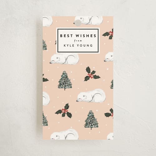 This is a peach gift tags by Cass Loh called sleeping polar bear printing on signature in tag