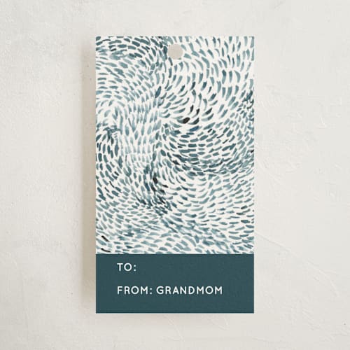 This is a teal gift tags by Yaling Hou Suzuki called indigo wave printing on signature in tag