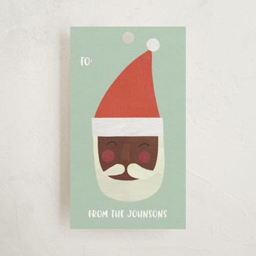 This is a pistachio gift tags with standard by melanie mikecz called multi-cultural santas printing on signature in tag