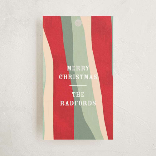 This is a poinsettia gift tags with standard by Baumbirdy called holiday wave printing on signature in tag