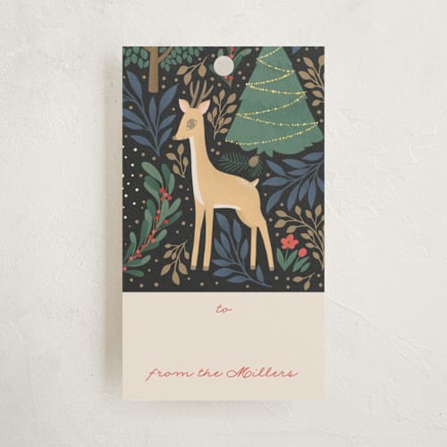 This is a snow gift tags by Shannon Chen of Four Wet Feet Studio called reindeer forest printing on signature in tag