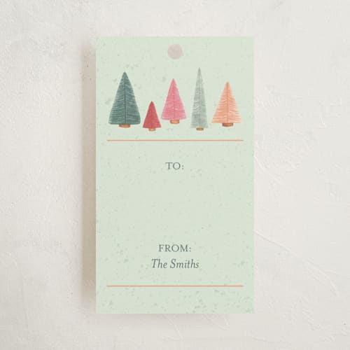 This is a mint gift tags by Janet Hirata Stall called bottle brush forest printing on signature in tag