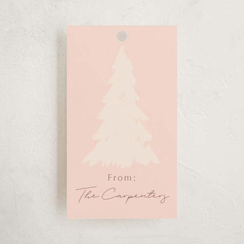 This is a gumdrop gift tags by Rebecca Rueth called gilded forest printing on signature in tag