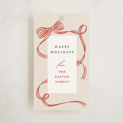 This is a holly berry gift tags by Carrie ONeal called neddy printing on signature in tag