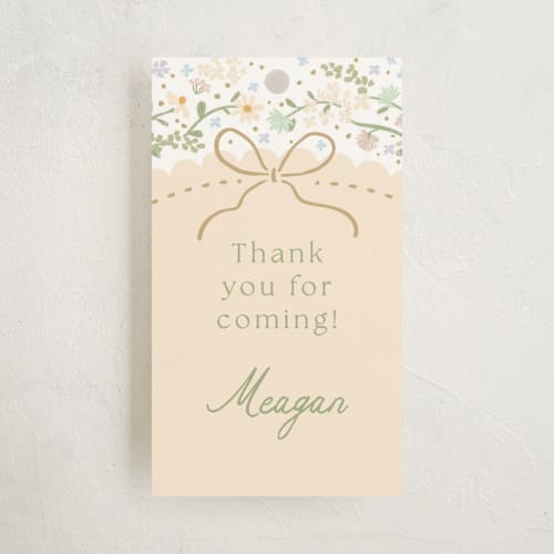 This is a vanilla baby shower favor tags with standard by Jennifer Wick called new blooms printing on signature in tag