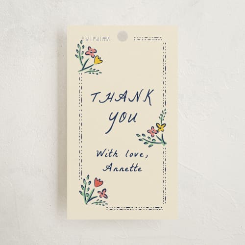 This is a midnight baby shower favor tags with standard by Sarah Rosenthal called blossoming love printing on signature in tag