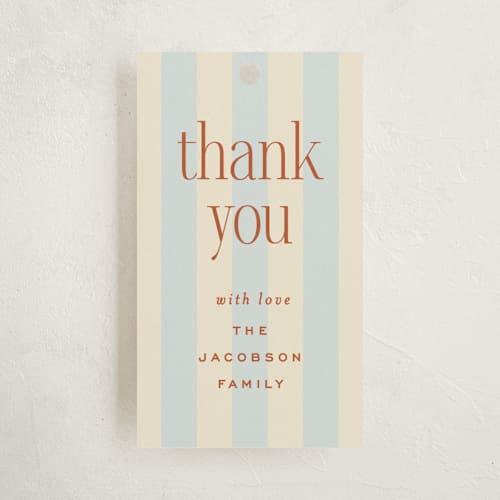 This is a powder blue baby shower favor tags with standard by Ellen Schlegelmilch called we're having a party printing on signature in tag