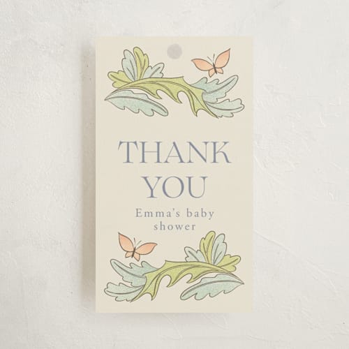 This is a vanilla baby shower favor tags with standard by Sabrin Deirani called vintage magic town printing on signature in tag