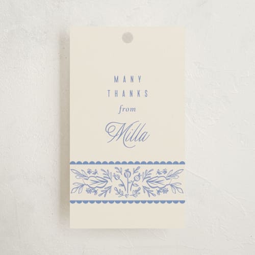 This is a cobalt baby shower favor tags with standard by Ana Sharpe called bloomy baby printing on signature in tag