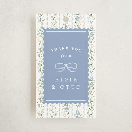 This is a cornflower baby shower favor tags with standard by Erin L. Wilson called dorothy printing on signature in tag