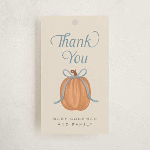This is a cornflower baby shower favor tags with standard by Laura Hankins called pumpkins + bows printing on signature in tag