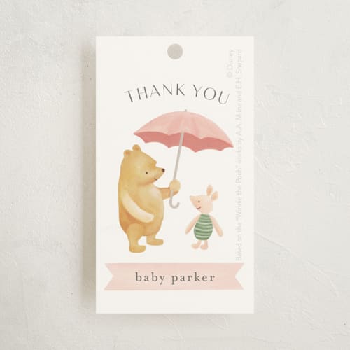 This is a blush baby shower favor tags with standard by Katherine Moynagh called disney's pooh and piglet printing on signature in tag