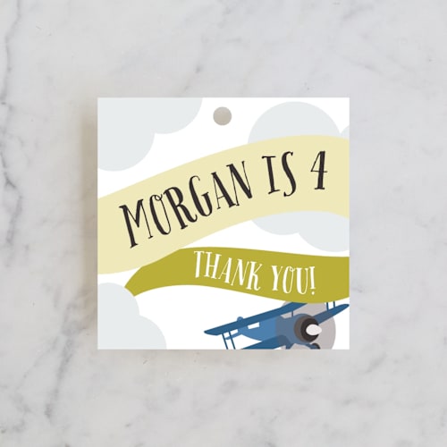 This is a mustard kids gift tags with standard by Haley Warner called banner takeoff printing on signature in tag