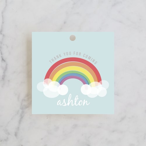 This is a soft teal kids gift tags with standard by Angela Garrick called rainbow celebration printing on signature in tag