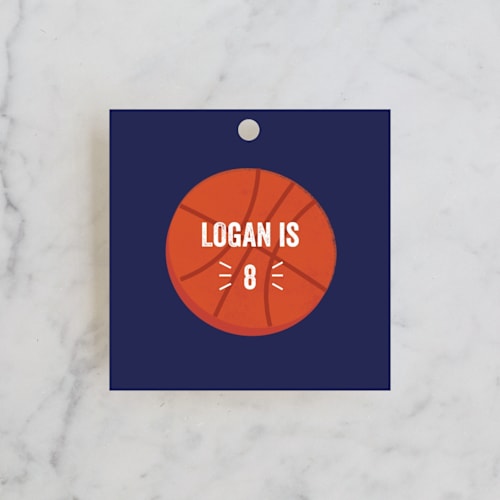 This is a navy kids gift tags with standard by Anupama called game night printing on signature in tag
