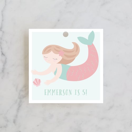 This is a coral kids gift tags with standard by Angela Thompson called sweet mermaid printing on signature in tag