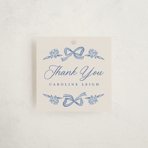 This is a indigo party favor tags with standard by Vera Lim called belle printing on signature in tag