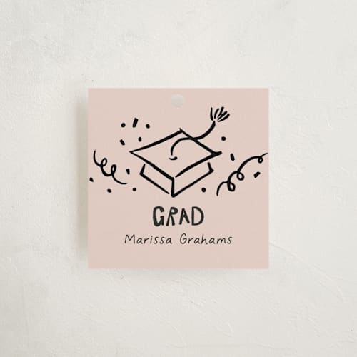 This is a blush graduation tags with standard by Tamara Hilje called celebration square printing on signature in tag