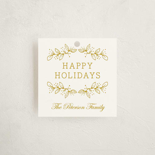 This is a golden gift tags by Oscar and Emma - Karly Depew called joyful season printing on signature in tag