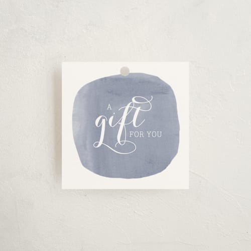 This is a lilac gift tags with standard by Penelope Poppy called simply baby printing on signature in tag