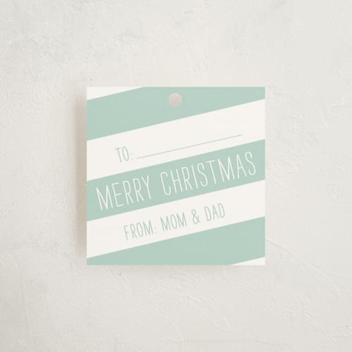 This is a frost gift tags with standard by Sarah Brown called santa's wrap printing on signature in tag