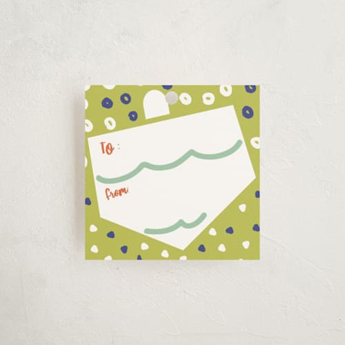 This is a jade gift tags with standard by Ariel Rutland called dreidel dance printing on signature in tag