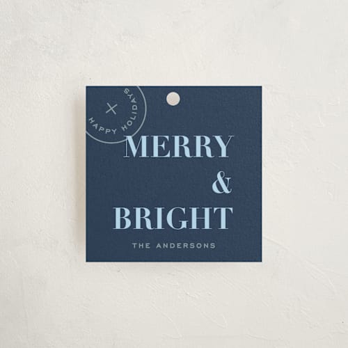 This is a denim gift tags by Joyce Pinheiro called holiday seal printing on signature in tag