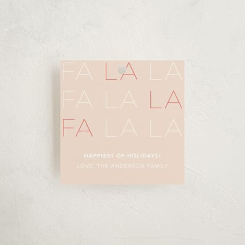 This is a coral gift tags by Joyce Pinheiro called fa la la la la printing on signature in tag