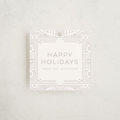 This is a champagne gift tags by Phrosné Barwood called geo gold printing on signature in tag