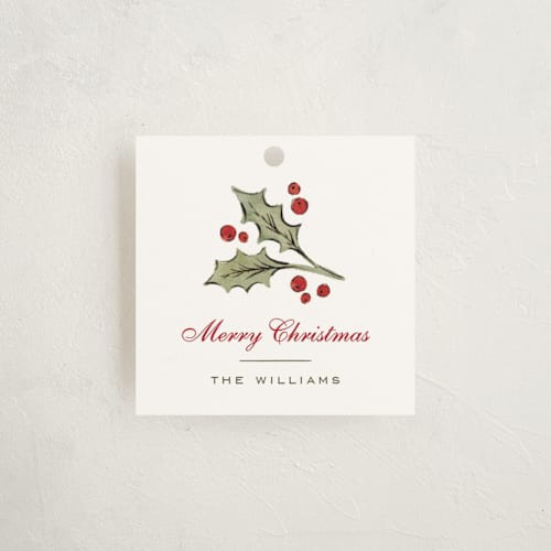 This is a cranberry gift tags by Wildfield Paper Co called holly monogram printing on signature in tag