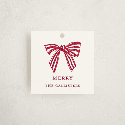 This is a candy cane gift tags by Mere Paper called stamped with a bow printing on signature in tag