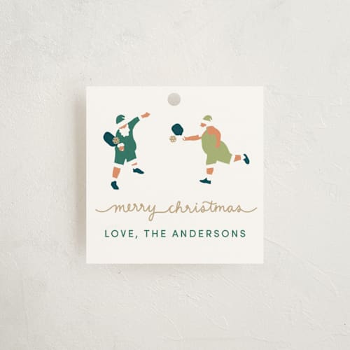 This is a aqua gift tags by tara berg called pickleball santa printing on signature in tag
