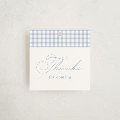 This is a baby blue baby shower favor tags with standard by Olivia Raufman called gingham rockinghorse printing on signature in tag
