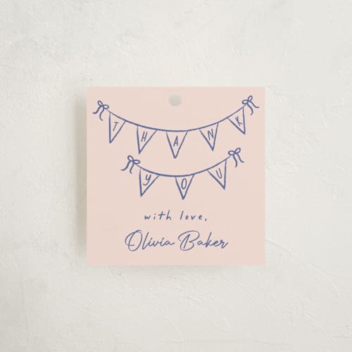This is a cupcake baby shower favor tags with standard by Ashley Iwafuchi called baby garland printing on signature in tag