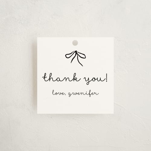 This is a cotton baby shower favor tags with standard by Deynaaz Daraei called okarche printing on signature in tag