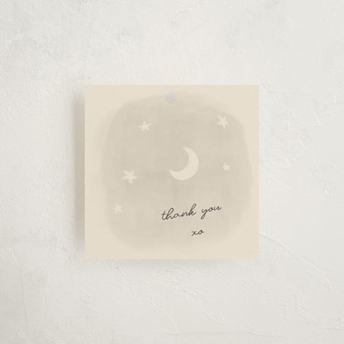 This is a cream baby shower favor tags with standard by Ani Somi called lullaby printing on signature in tag