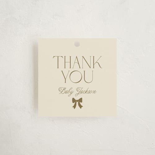 This is a vanilla baby shower favor tags with standard by Vera Lim called mini bows printing on signature in tag
