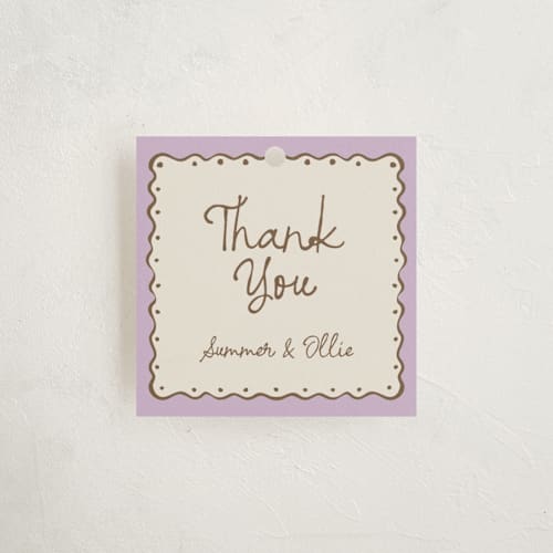 This is a lavender baby shower favor tags with standard by Pati Cascino called sugar printing on signature in tag