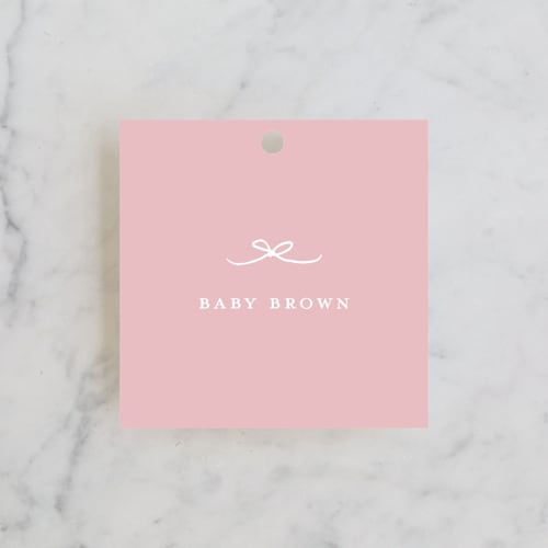 This is a blush baby shower favor tags with standard by Buddy Creative called tiny bow printing on signature in tag