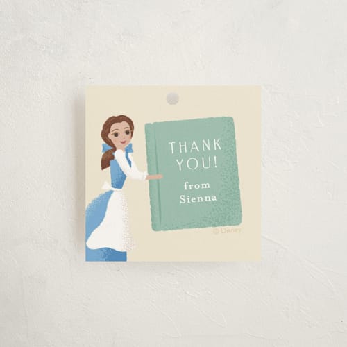 This is a hicory baby shower favor tags with standard by Jennifer Wick called disney's belle's books printing on signature in tag
