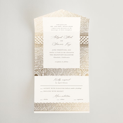 This is a lily all in one wedding invitations with foil pressed by Mansi Verma called gilded henna printing on value cover in all-in-one