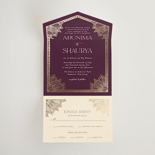 This is a plum all in one wedding invitations with foil pressed by Randi Cirelli called arunima printing on value cover in all-in-one