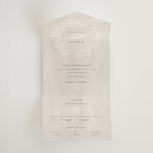 This is a fog all in one wedding invitations with standard by Pixel and Hank called winter wreath printing on value cover in all-in-one