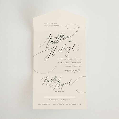 This is a ivory all in one wedding invitations with standard by Hannah Williams called tilted script printing on value cover in all-in-one