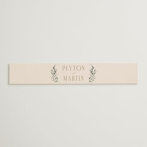 This is a pearl belly bands with standard by Leah Bisch called sprigs of joy printing on signature text in belly band