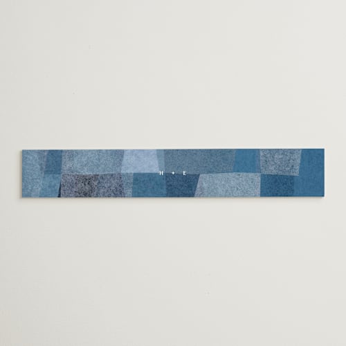 This is a seaside belly bands with standard by Carrie Moradi called denim patchwork printing on signature text in belly band