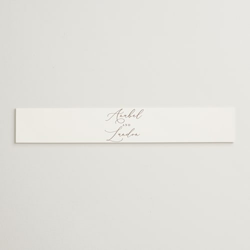 This is a pearl belly bands with standard by Hooray Creative called luxe script printing on signature text in belly band